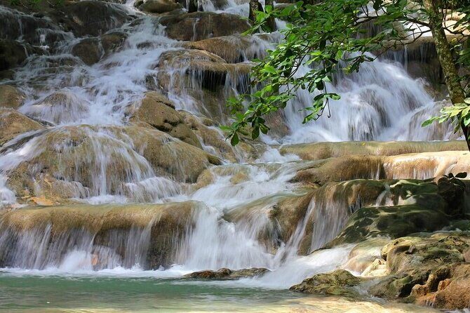 Action Pack Combo: Blue hole, river tubing and Dunn's River Falls - White River tubing: gentle rapids, calm stretches, and that playful river energy