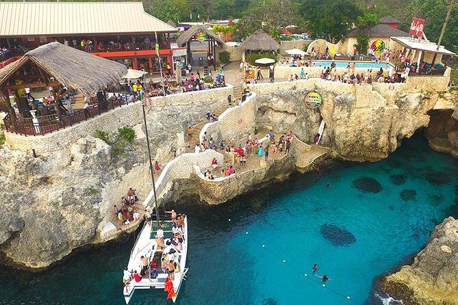 Catamaran Cruise Full Day Tour to Reef, Caves and Negril Beach - Margaritaville and Seven Mile Beach: where you reset before the cruise