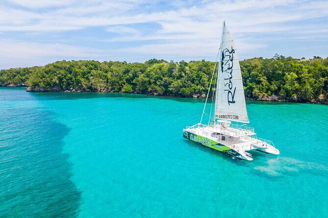 Dunn's River Catamaran Cruise From Ocho Rios - The onboard vibe: DJ, safety briefing, snacks, and open bar