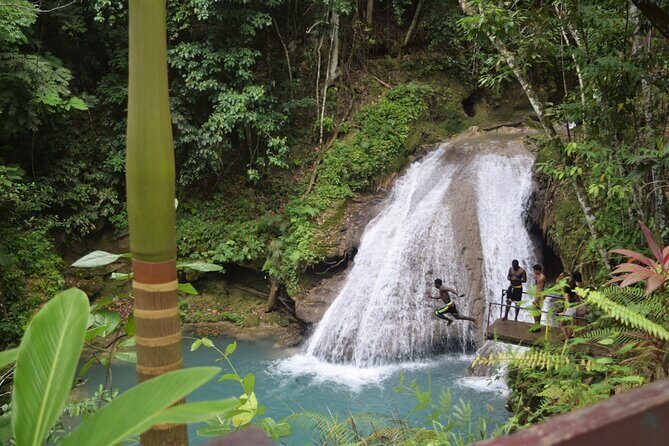 "Explore Scenic Tropical Waterfalls at Blue Hole" - The core experience at Blue Hole: waterfall pools, caves, and optional thrills